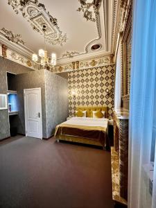 Ένα ή περισσότερα κρεβάτια σε δωμάτιο στο Nizami Boutique Hotel