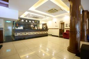 a lobby with a bar in a building at Hotel Bintang Kuala Lumpur in Kuala Lumpur