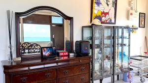 a room with a dresser and a mirror at SEA BASE Onna in Onna +60 photos