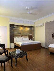 Postel nebo postele na pokoji v ubytování Hotel Exclusive