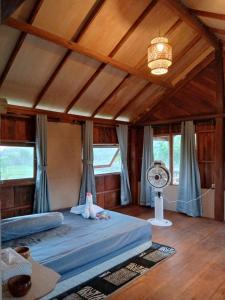 Foto dalla galleria di Cozy cove hut a Pulau Sarang 1 altra foto