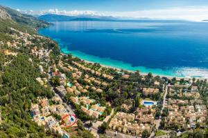 an aerial view of a city and the ocean at Villa Leo in Barbati
