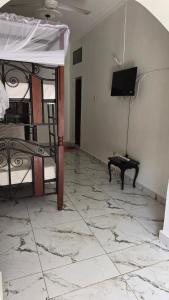 Μια τηλεόραση ή/και κέντρο ψυχαγωγίας στο Manyatta Hotels & Apartments