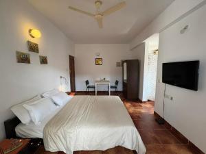 Giường trong phòng chung tại Firefly Studio Apartment +13 ảnh
