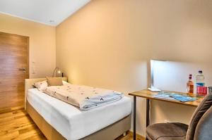 Postel nebo postele na pokoji v ubytování Ferienwohnungen Schiltenstein