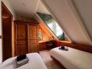 Postel nebo postele na pokoji v ubytování La Closerie de Baneuil + 129 fotografií