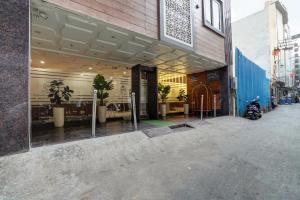 a store front of a building on a street at Hotel Royal Rosette with free Wi-Fi Near New Delhi Railway Station and Connaught Place in New Delhi