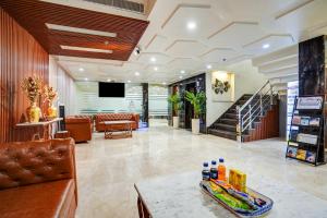 a lobby of a hospital with a waiting room at Hotel Royal Rosette with free Wi-Fi Near New Delhi Railway Station and Connaught Place in New Delhi