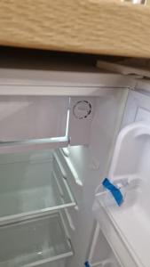 an empty refrigerator with its door open and a drawer at Park apartament in Bălţi