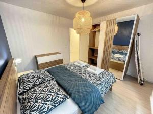 Ένα ή περισσότερα κρεβάτια σε δωμάτιο στο Superbe appartement DREAM HOME Near Basel