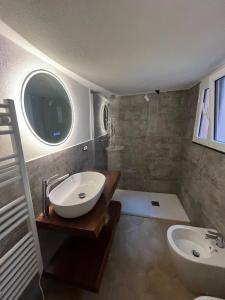 Koupelna v ubytování La casetta + 10 fotografií