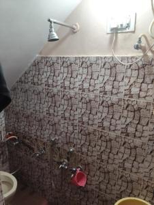 Koupelna v ubytování Veena Vihar