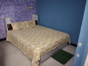 Postel nebo postele na pokoji v ubytování Veena Vihar