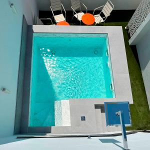 Bazén v ubytování Lukanda Hospec Olehousing nebo v jeho okolí