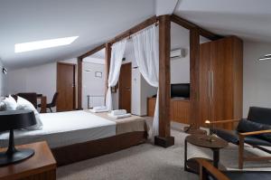 Ένα ή περισσότερα κρεβάτια σε δωμάτιο στο Boutique Hotel Uniqato +53 φωτογραφίες