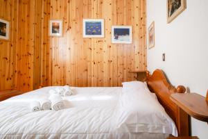 Ένα ή περισσότερα κρεβάτια σε δωμάτιο στο Casa Natura, Tradizione e Relax