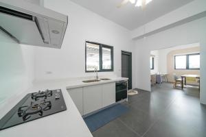 Kuchyň nebo kuchyňský kout v ubytování Tian Che Tian Yuan + 6 fotografií