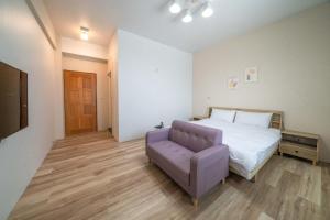 Postel nebo postele na pokoji v ubytování Tian Che Tian Yuan