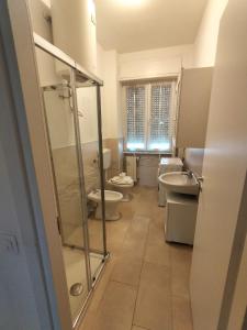 Koupelna v ubytování Trilocale Via Veneto - F&L Apartment