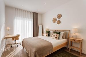 Ένα ή περισσότερα κρεβάτια σε δωμάτιο στο Casa das Tordoveias +135 φωτογραφίες