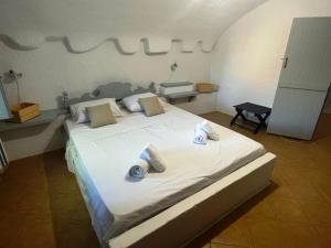 Ένα ή περισσότερα κρεβάτια σε δωμάτιο στο Rose Home