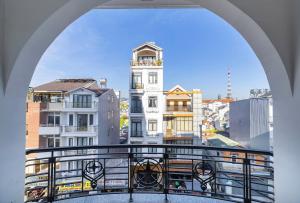 a view of a city from a balcony at Khách sạn Pine Hill Hotel Dalat in Da Lat
