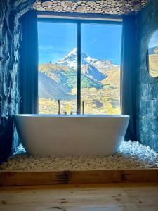 Nespecifikovaný výhled na hory nebo výhled na hory při pohledu z apartmánu