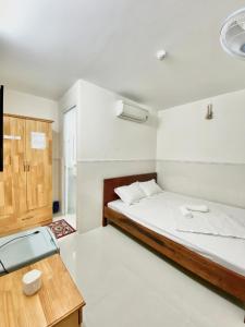 Ένα ή περισσότερα κρεβάτια σε δωμάτιο στο Bích Thảo Hotel