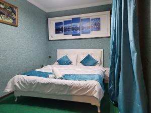 Postel nebo postele na pokoji v ubytování Baku Old Culture Inn + 15 fotografií