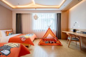 Postel nebo postele na pokoji v ubytování Zhengzhou Agricultural University, Henan Provincial Museum, Meilun Hotel + 45 fotografií