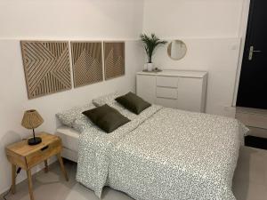 En eller flere senge i et værelse på Nid douillet au coeur d'Auxerre