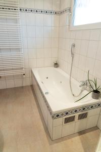 Vannituba majutusasutuses Heimliche Liebe - Ferienhaus +23 fotot