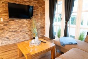 Televiisor ja/või meelelahutuskeskus majutusasutuses Heimliche Liebe - Ferienhaus