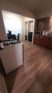 a kitchen with a stove and a counter top at GA home in Milwaukee +14 photos