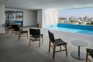 Πισίνα στο ή κοντά στο AC Hotel by Marriott San Luis Potosi