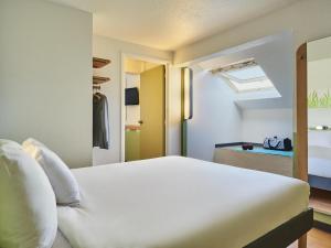 Фотография из галереи Ibis Budget Versailles Coignieres в городе Куаньер