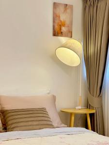 Ένα ή περισσότερα κρεβάτια σε δωμάτιο στο P-Phen popular condo