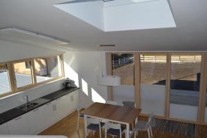 Η κουζίνα ή μικρή κουζίνα στο Ferienhaus Sonneninsel In Velden Am Wörthersee