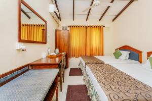 Ένα ή περισσότερα κρεβάτια σε δωμάτιο στο Blue Magpie Lodge Sinharaja