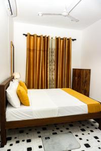 Ένα ή περισσότερα κρεβάτια σε δωμάτιο στο behind ocean villa