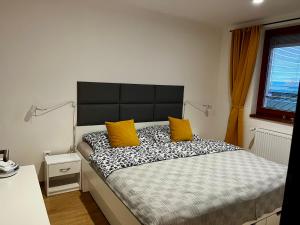 Postel nebo postele na pokoji v ubytování Apartmán B2