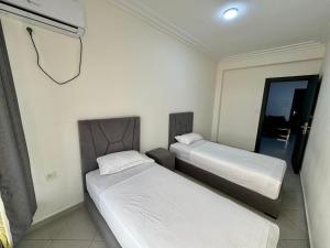 Ένα ή περισσότερα κρεβάτια σε δωμάτιο στο malabata tanger