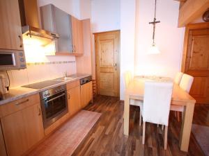 Kuchyň nebo kuchyňský kout v ubytování Mansion in Eben near Ski Salzburger Sportwelt + 12 fotografií