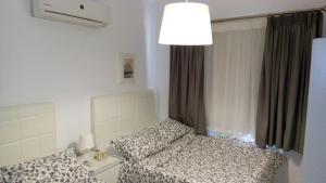 Ένα ή περισσότερα κρεβάτια σε δωμάτιο στο Stella heights North cost