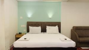 Ένα ή περισσότερα κρεβάτια σε δωμάτιο στο Hotel National Tourist Home +25 φωτογραφίες