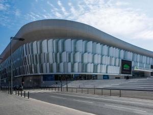 a large building with white windows and a street at ibis Budget Courbevoie Paris La Défense in Courbevoie