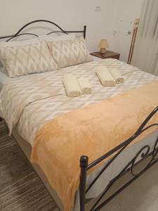 Postel nebo postele na pokoji v ubytování Apartman Novak Luxury