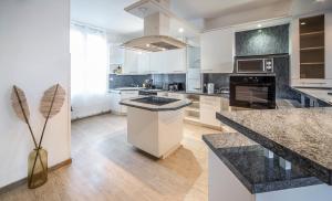 Køkken eller tekøkken på Duplex - centre-ville + 5 billeder