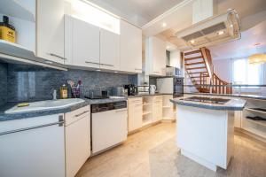 Køkken eller tekøkken på Duplex - centre-ville