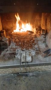 Gril dostupný pro hosty v apartmánu